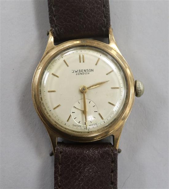 A gentlemans 9ct gold J.W. Benson manual wind wrist watch with presentation inscription on the back of the case.